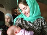 Покрестились